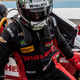 Dane Cameron exits the No. 31 Action Express Corvette Daytona Prototype during a driver change.